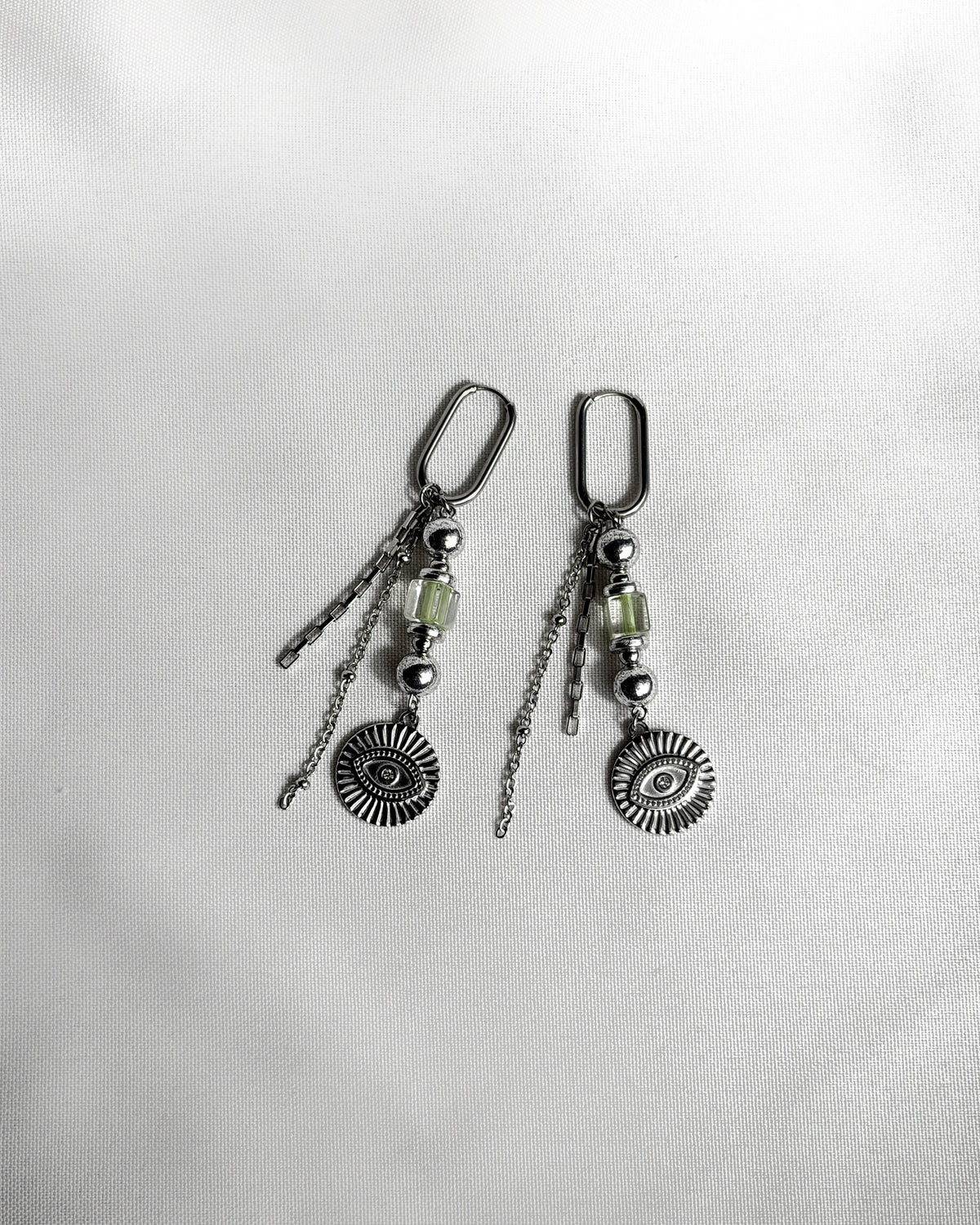 Paire de boucles d’oreilles argenté