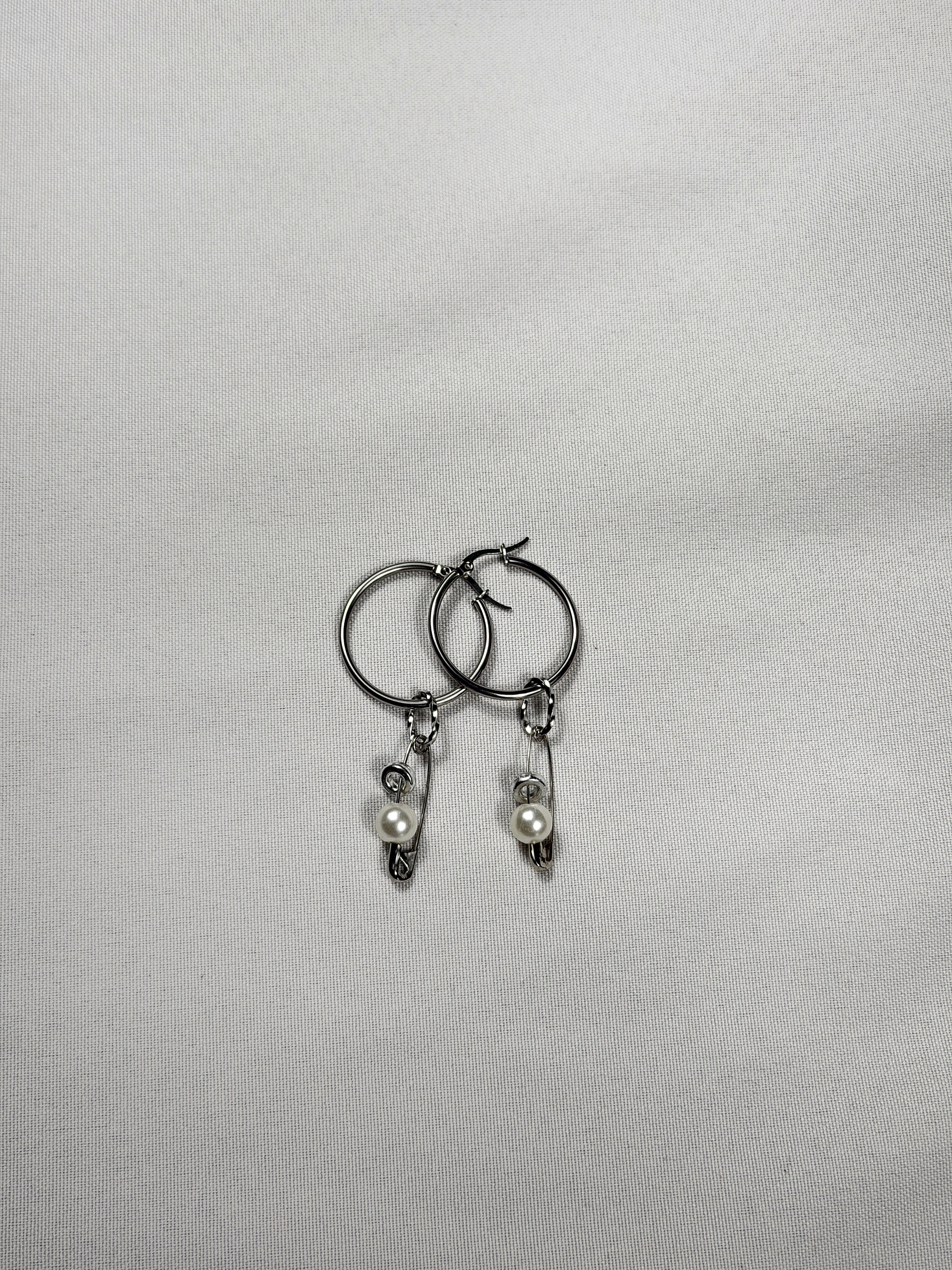 Paire de boucles d’oreilles argenté