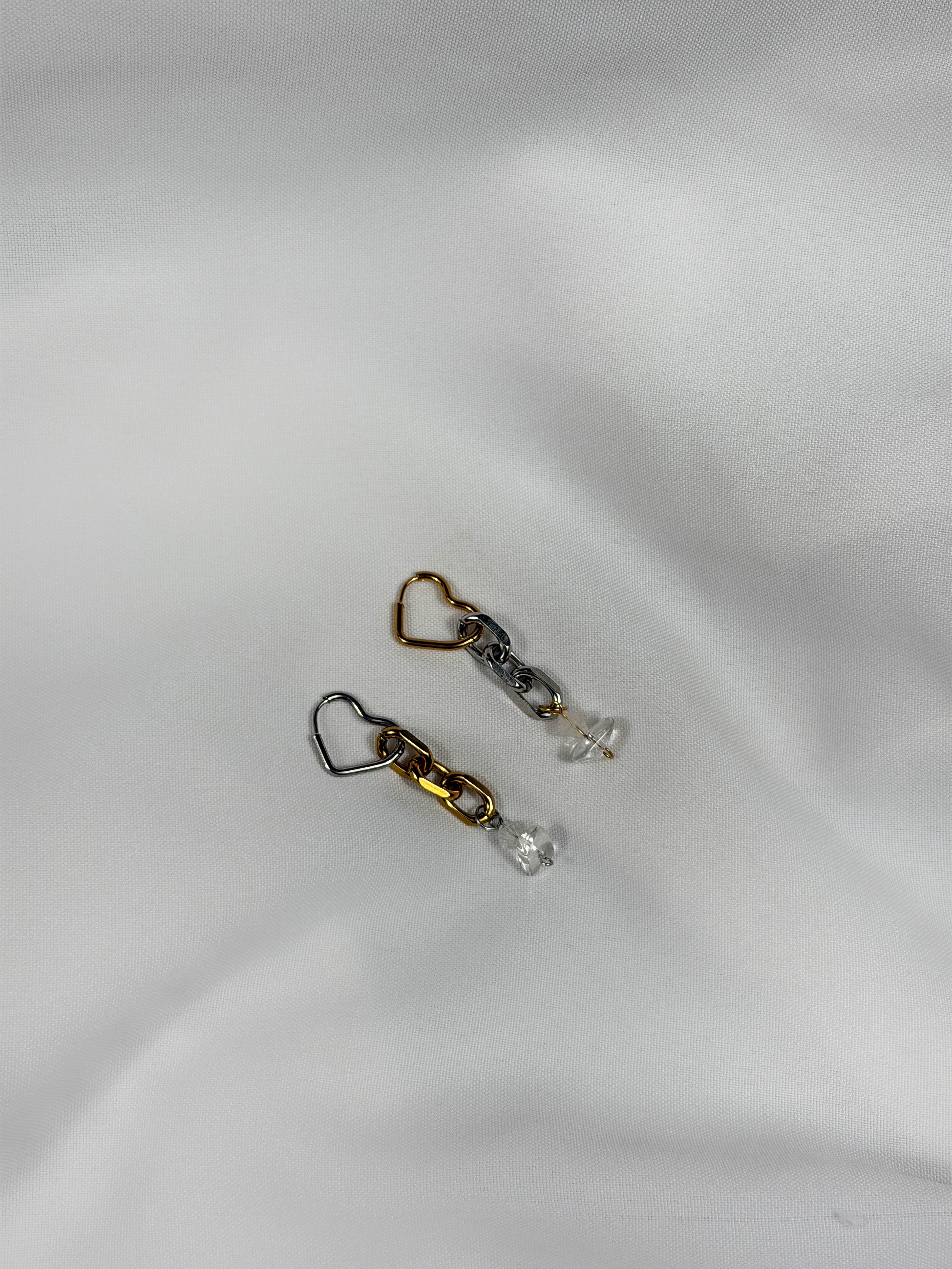 Paire de boucles d’oreilles mix dorés et argentés
