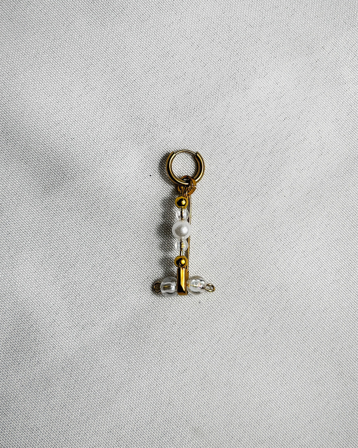 Mini mono boucle doré
