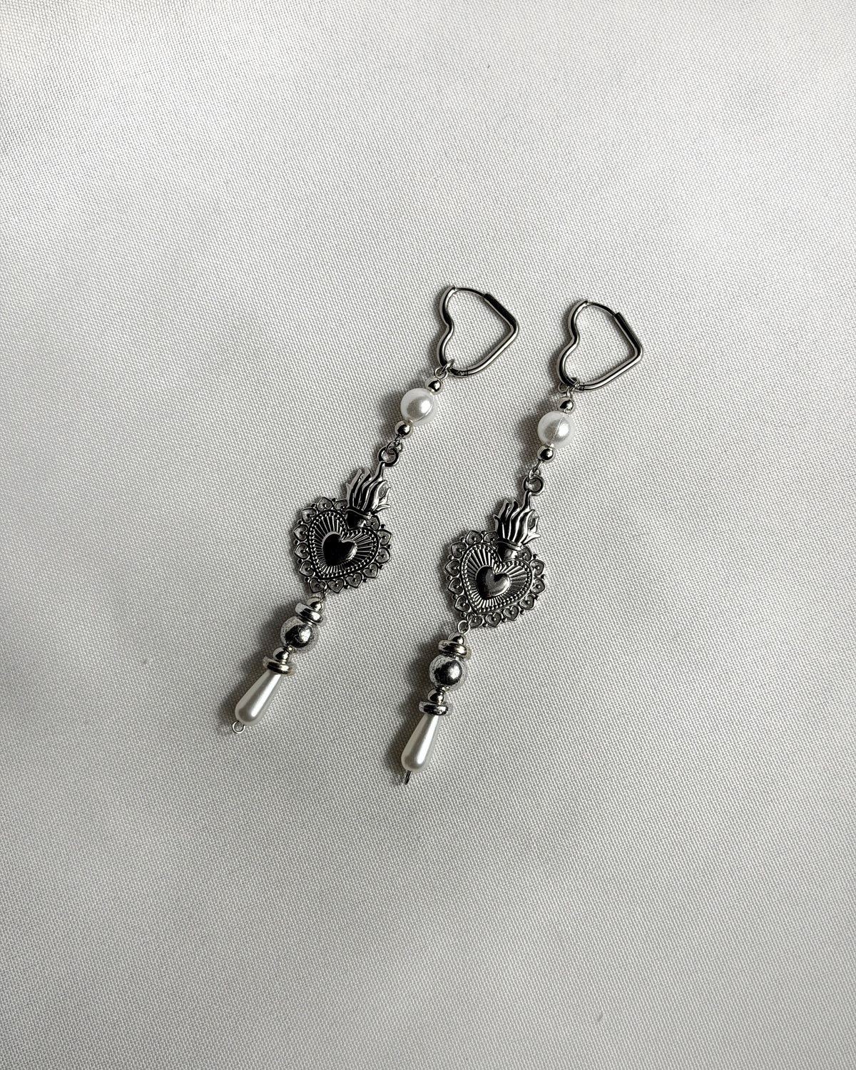 Paire de boucles d’oreilles argenté
