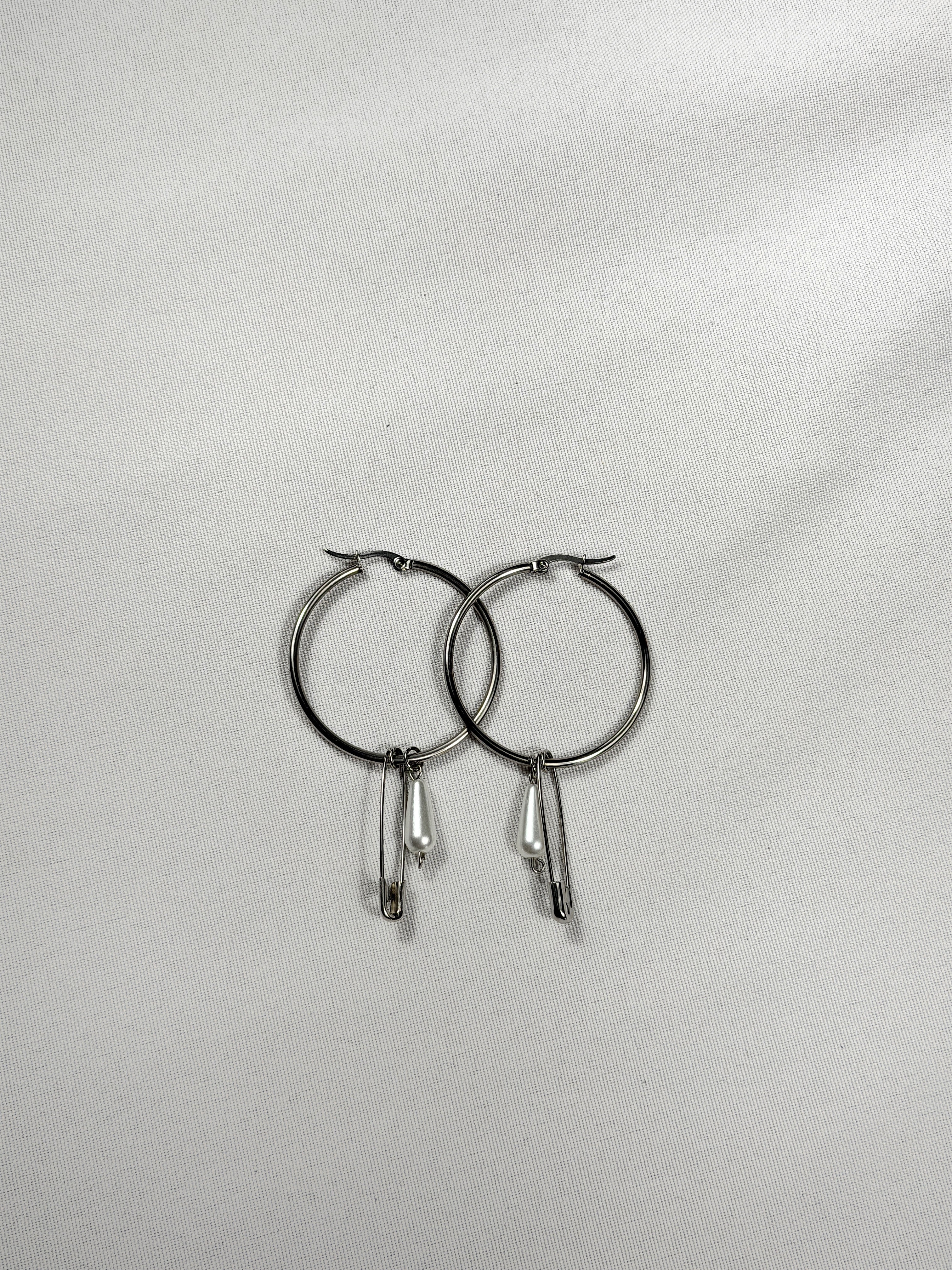 Paire de boucles d’oreilles argenté