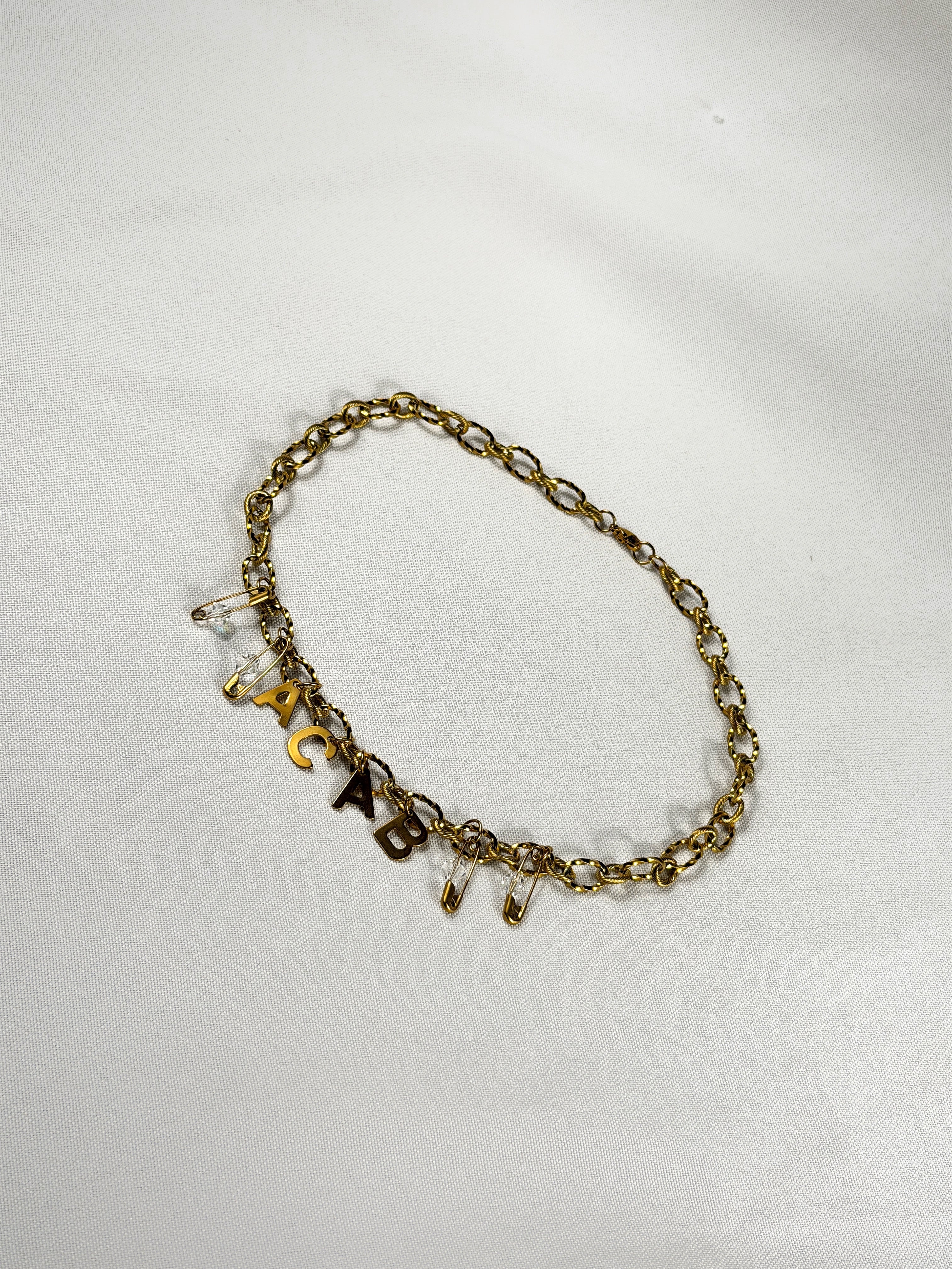 Collier ACAB doré