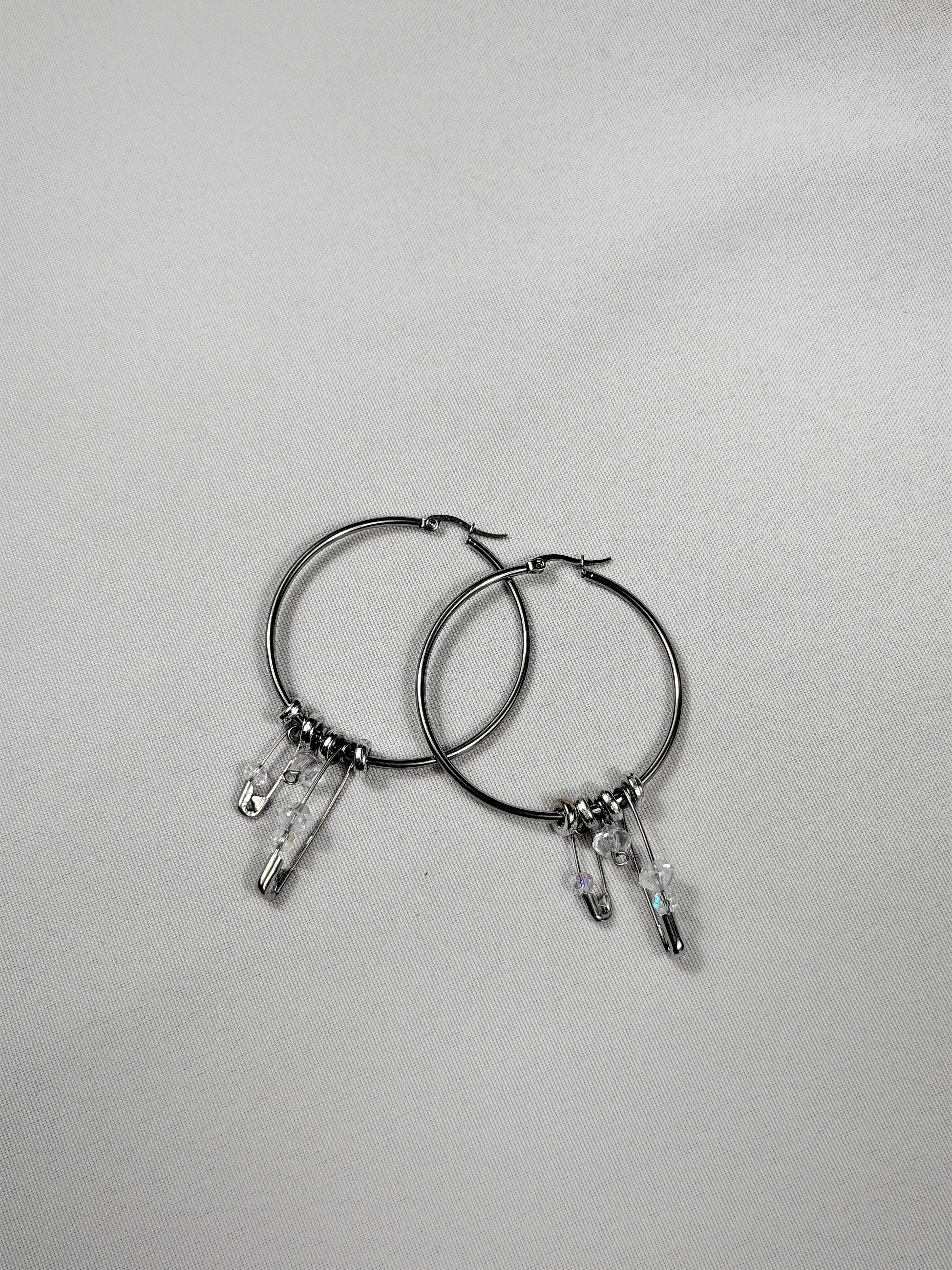 Paire de boucles d’oreilles argenté