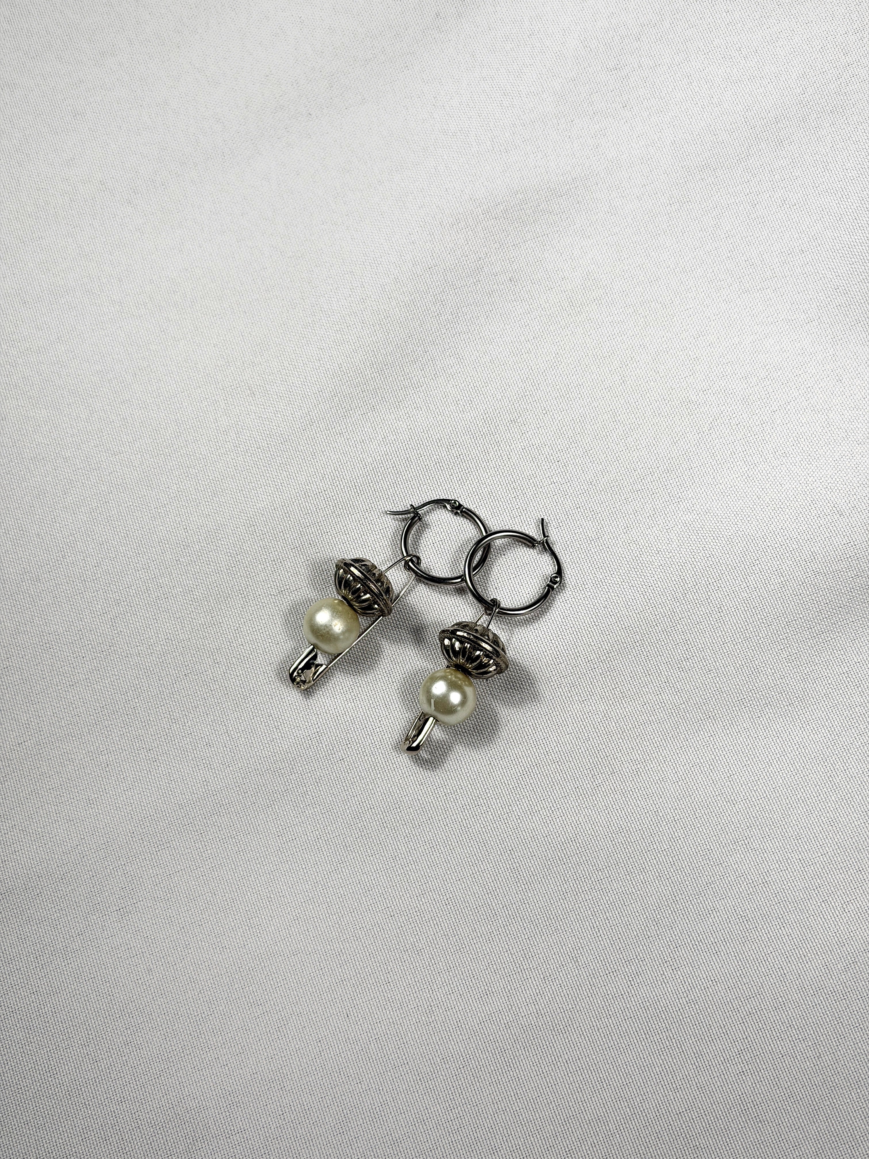 Paire de boucles d’oreilles argenté
