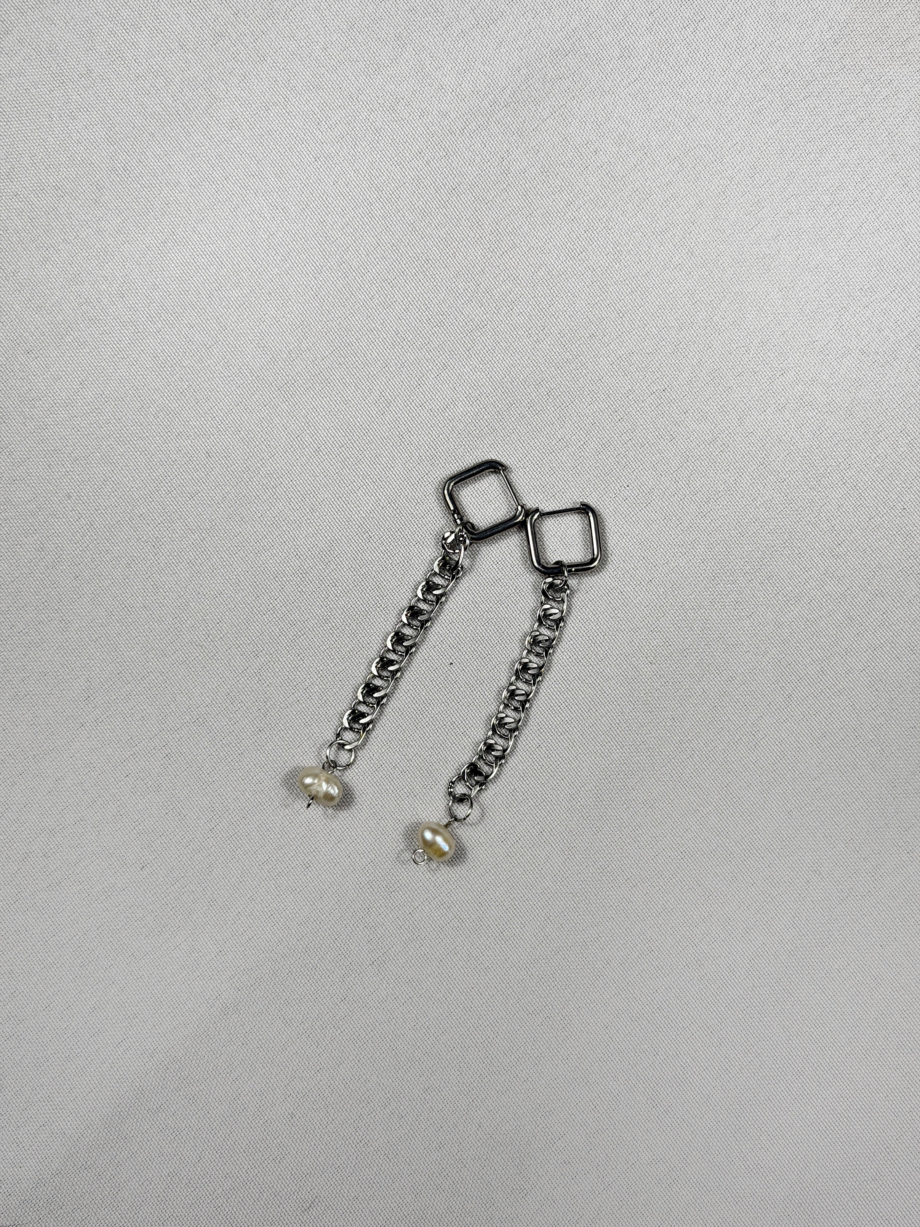 Paire de boucles d’oreilles argenté